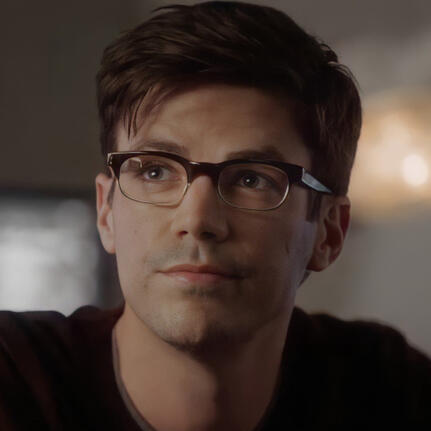 Picture of Grant Gustin as Barry Allen with glasses on.